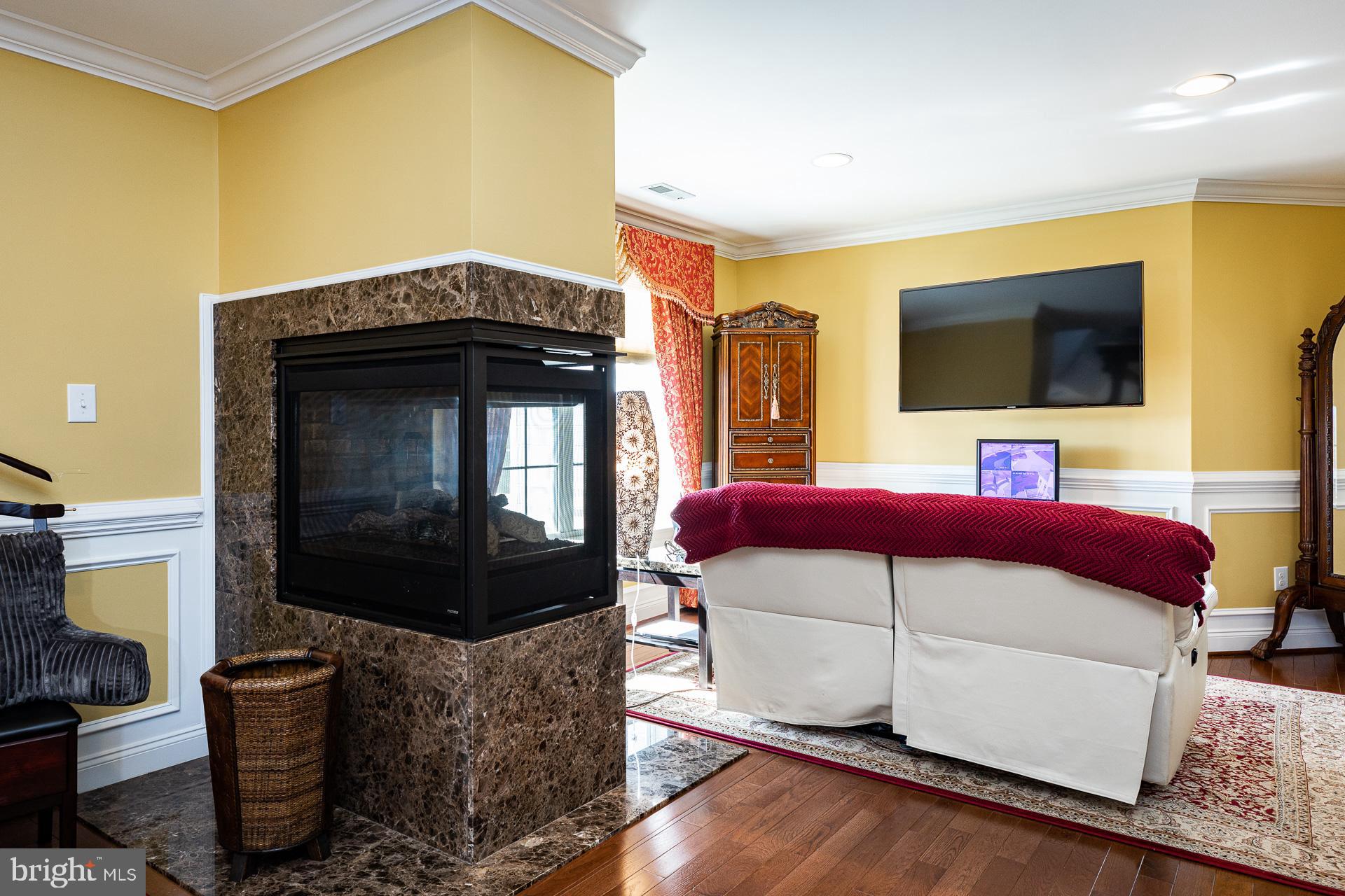 1454 Olmsted Drive Bear, DE 19701 - Photo 50 of 72 Owner's sitting room with gas fireplace