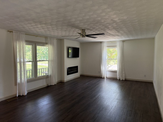 6241 Wards Mill Road Marion, IL 62959 - Photo 14 of 29 an empty room with wooden floor and windows