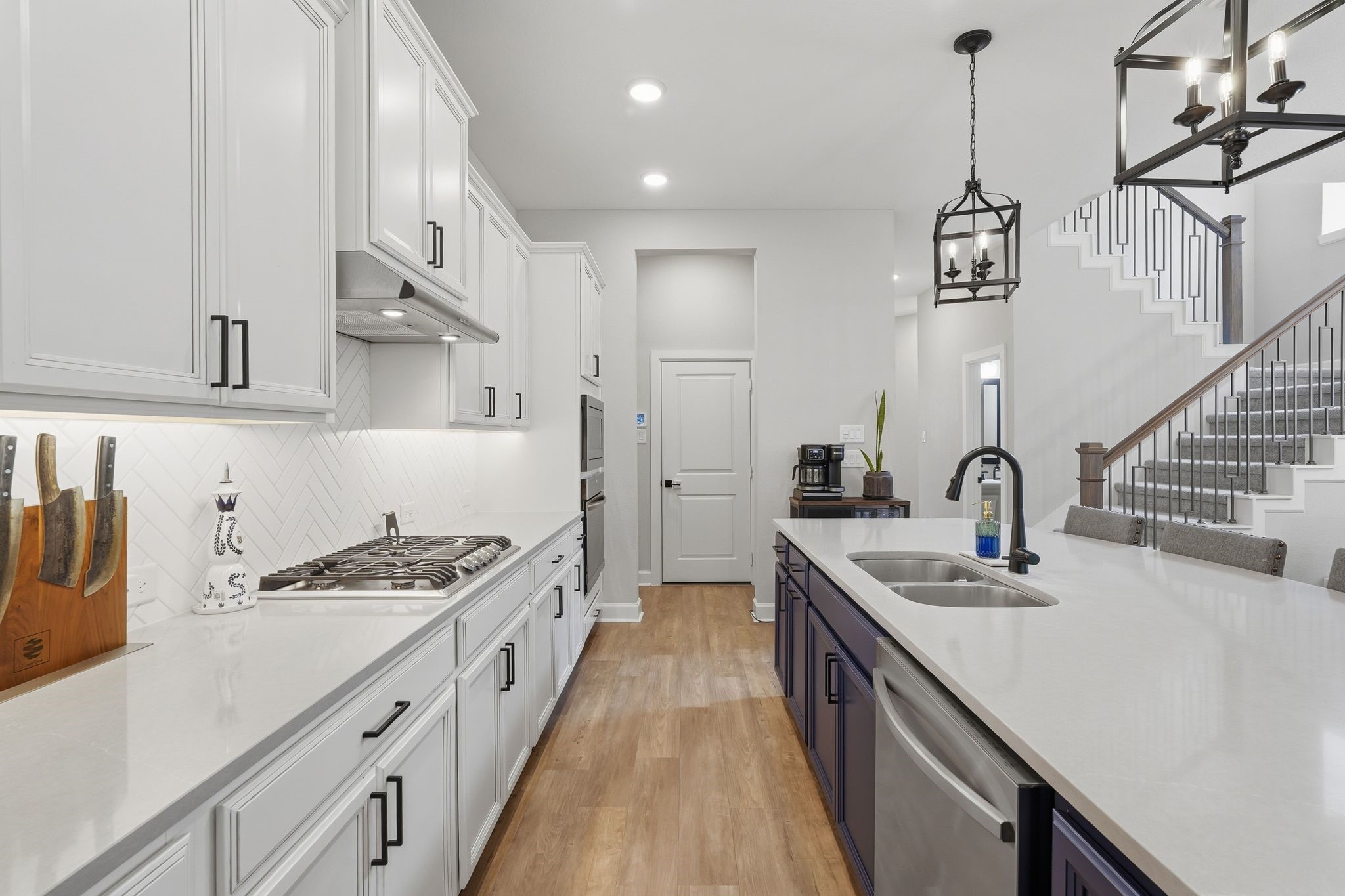 24423 Morningside Terrace Tomball, TX 77375 - Photo 15 of 47 a kitchen with stainless steel appliances a sink stove and cabinets