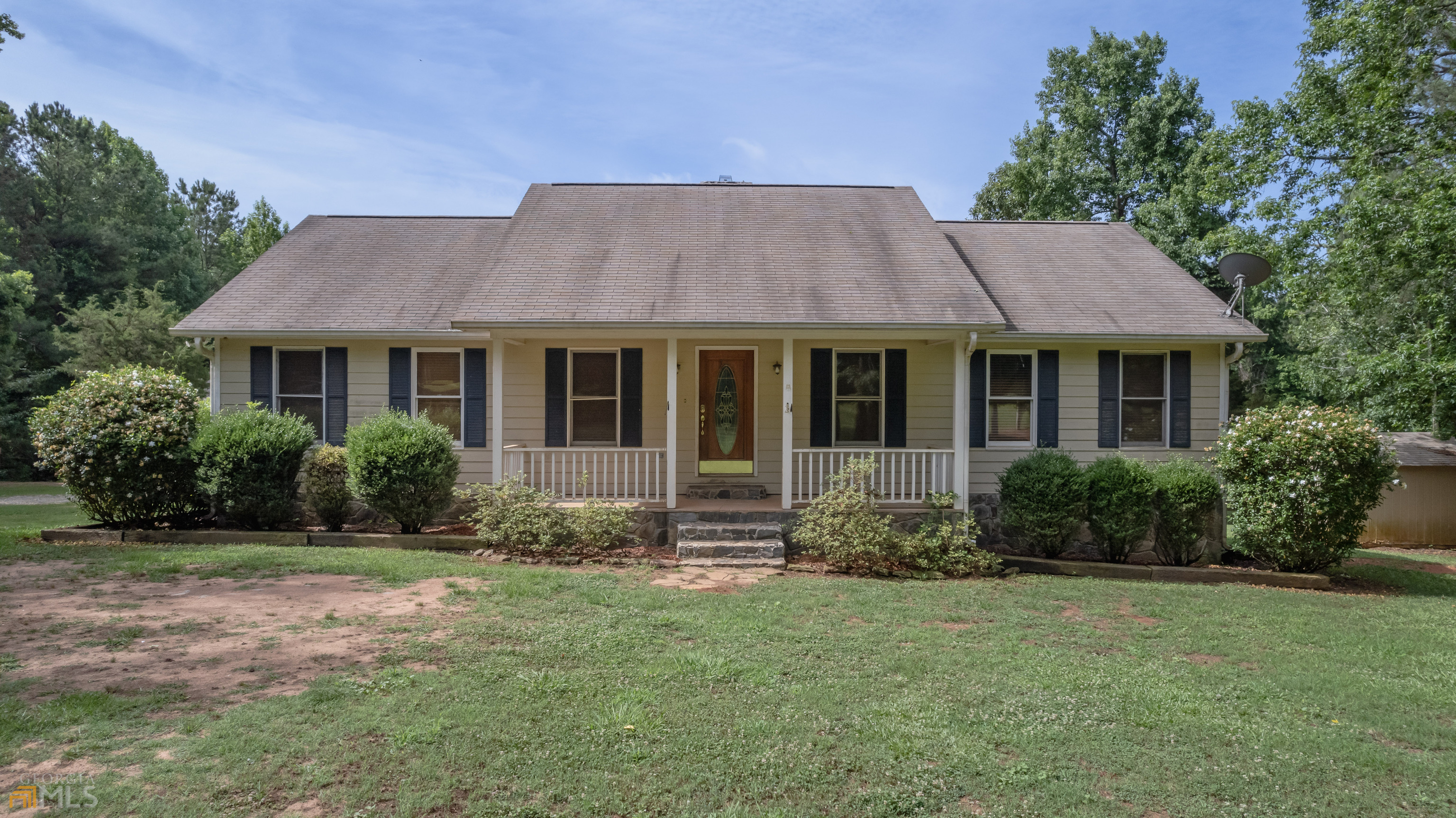 3151 Liberty Church Road Monticello, GA 31064 - Photo 1 of 1 a front view of a house with garden