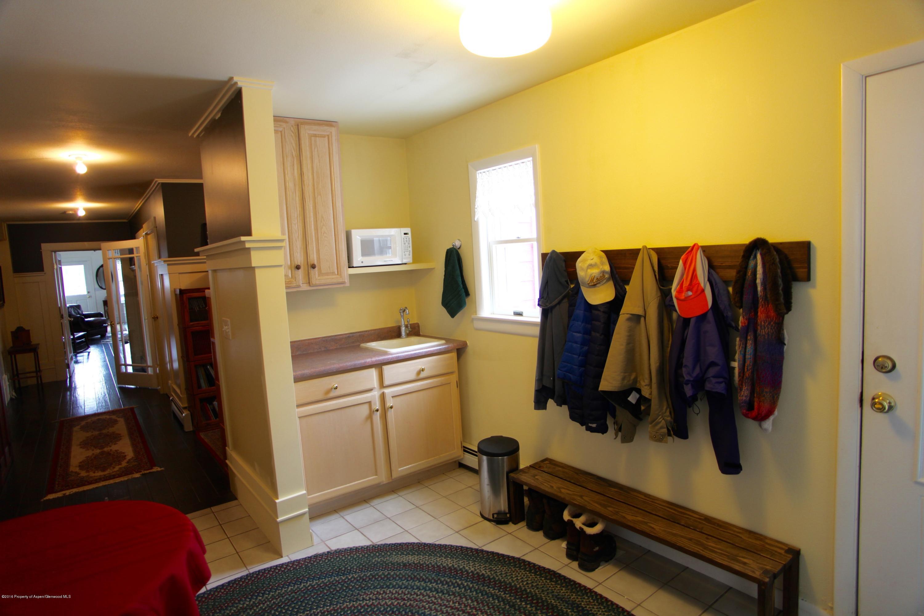 450 Redstone Boulevard Redstone, CO 81623 - Photo 6 of 16 a bedroom with a bed and a walk in closet