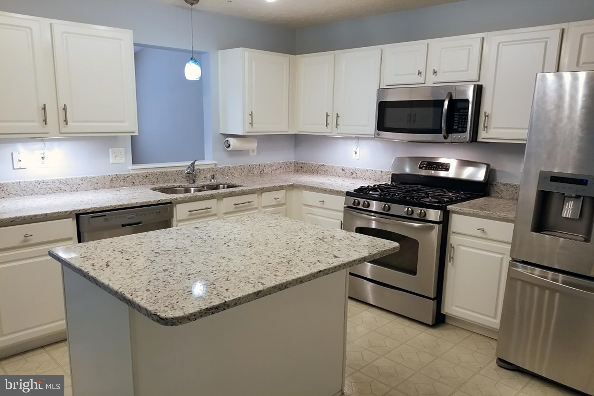 151 Carolstowne Road Reisterstown, MD 21136 - Photo 6 of 23 Kitchen with stainless & granite countertops