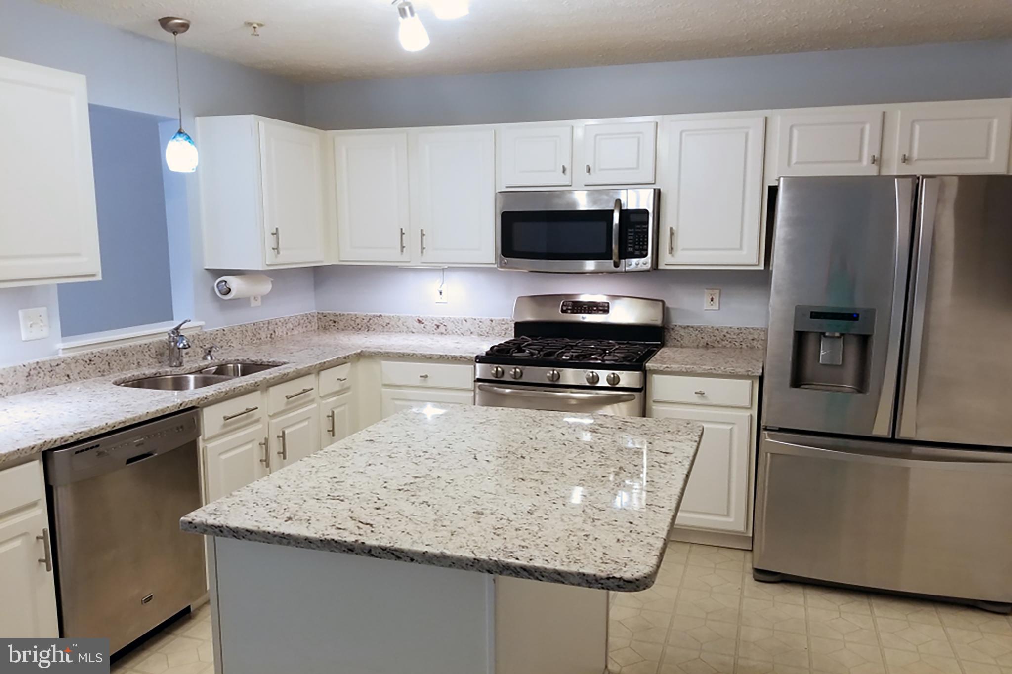 151 Carolstowne Road Reisterstown, MD 21136 - Photo 7 of 23 Kitchen with stainless & granite countertops