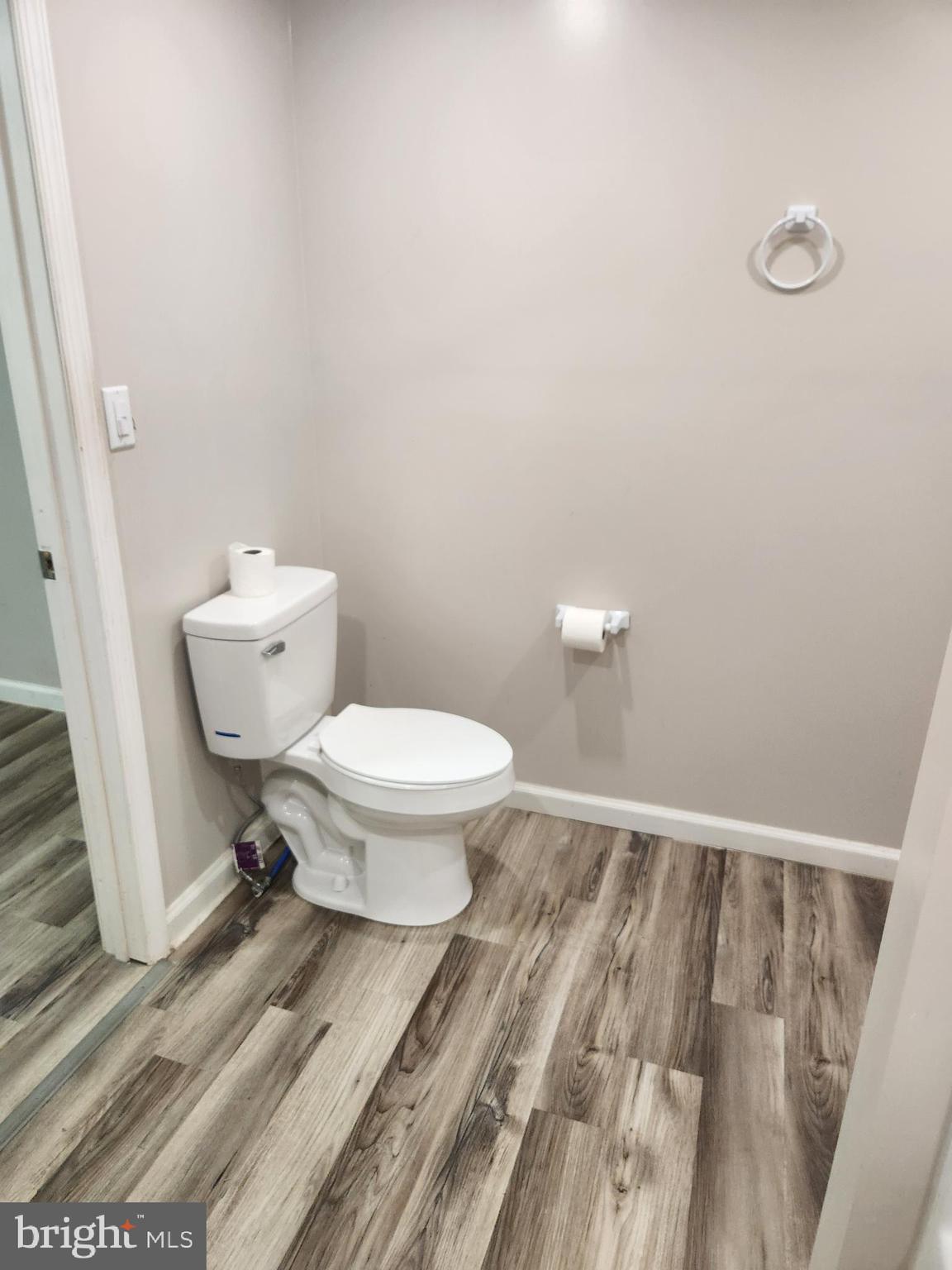 9349 Valley Road, Unit 107 Berkeley Springs, WV 25411 - Photo 7 of 8 a bathroom with a toilet and a shower