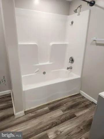 a bathroom with a bathtub