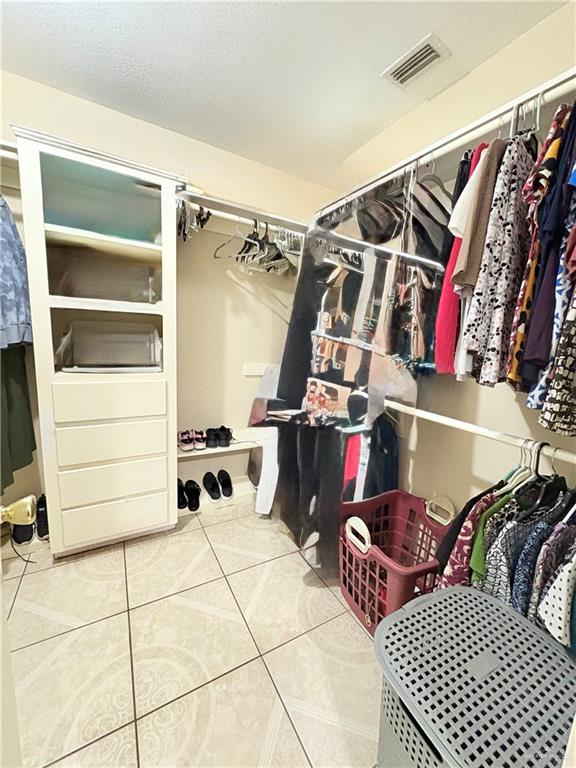2218 Lawndale Road Mission, TX 78572 - Photo 13 of 24 Spacious closet featuring tile patterned flooring and visible vents