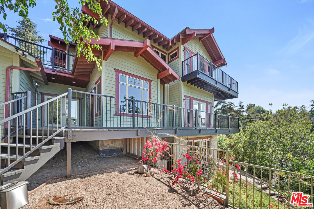 458 Rustic Drive Los Angeles, CA 90065 - Photo 1 of 41 a view of a house with wooden fence