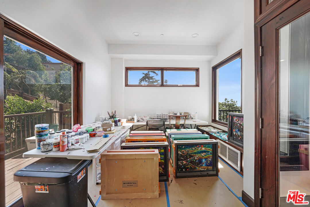 458 Rustic Drive Los Angeles, CA 90065 - Photo 17 of 41 a kitchen that has a stove and a table