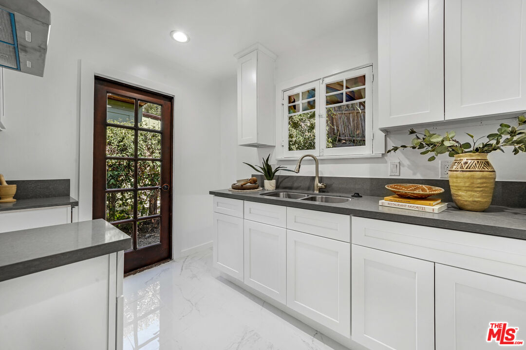 458 Rustic Drive Los Angeles, CA 90065 - Photo 41 of 41 a kitchen with a sink and a window