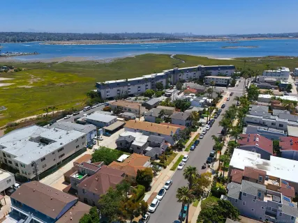 an aerial view of residential building with parking space