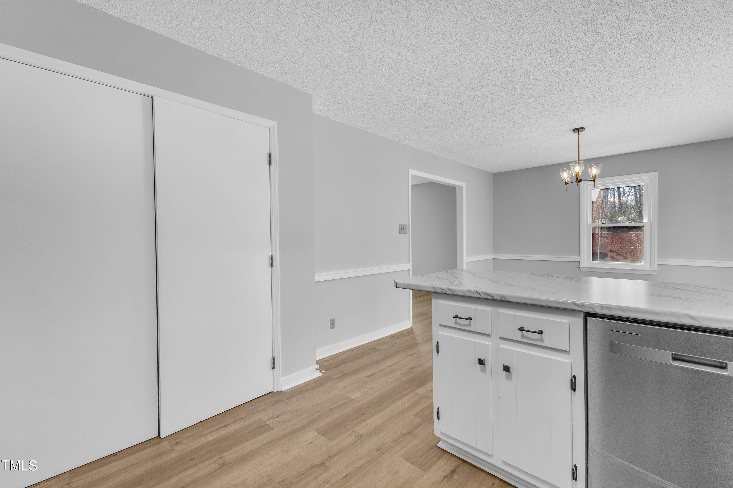 612 Miller Road Hillsborough, NC 27278 - Photo 13 of 35 a view of a kitchen with wooden floor