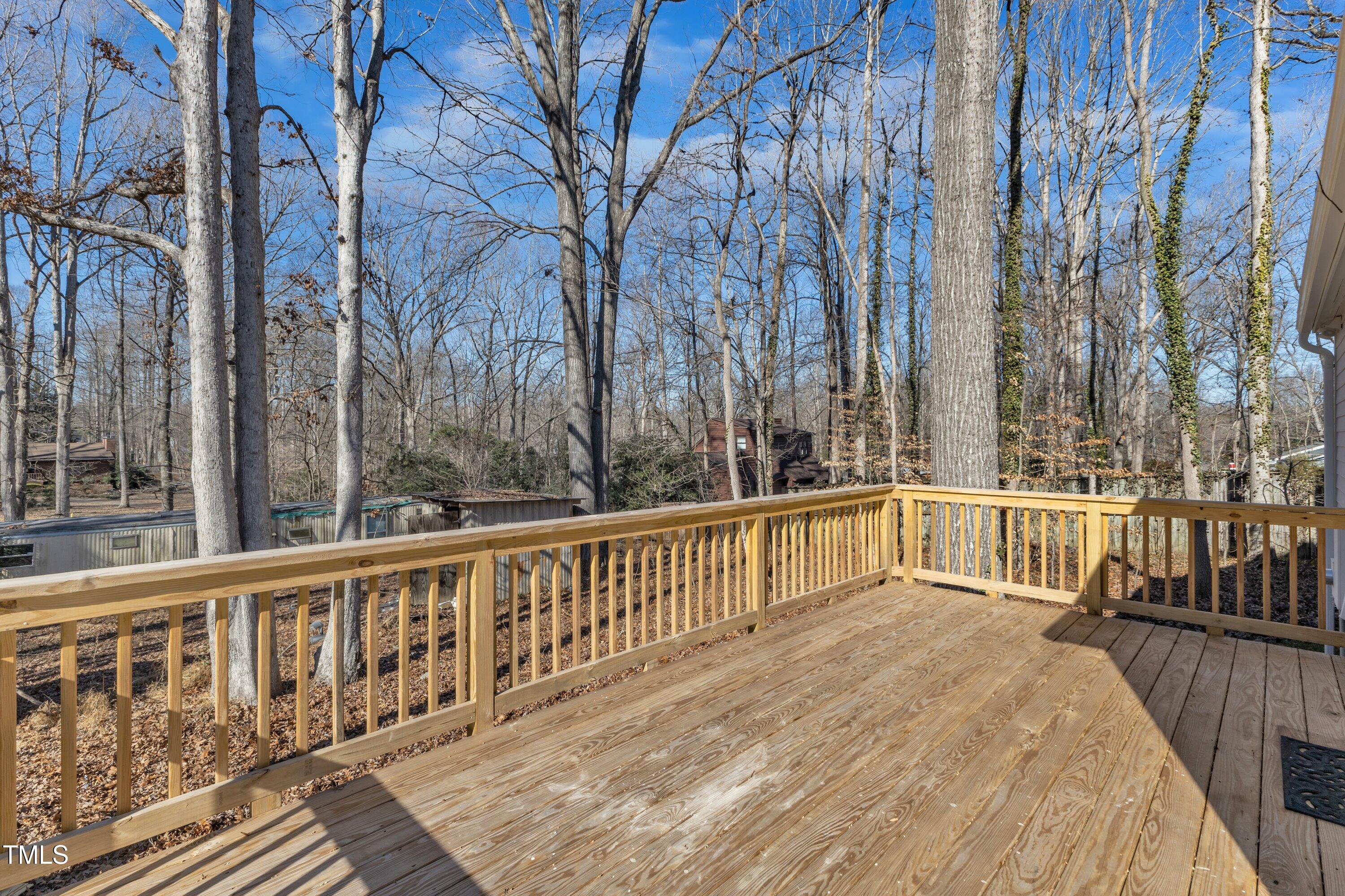612 Miller Road Hillsborough, NC 27278 - Photo 23 of 35 a view of a balcony with two trees