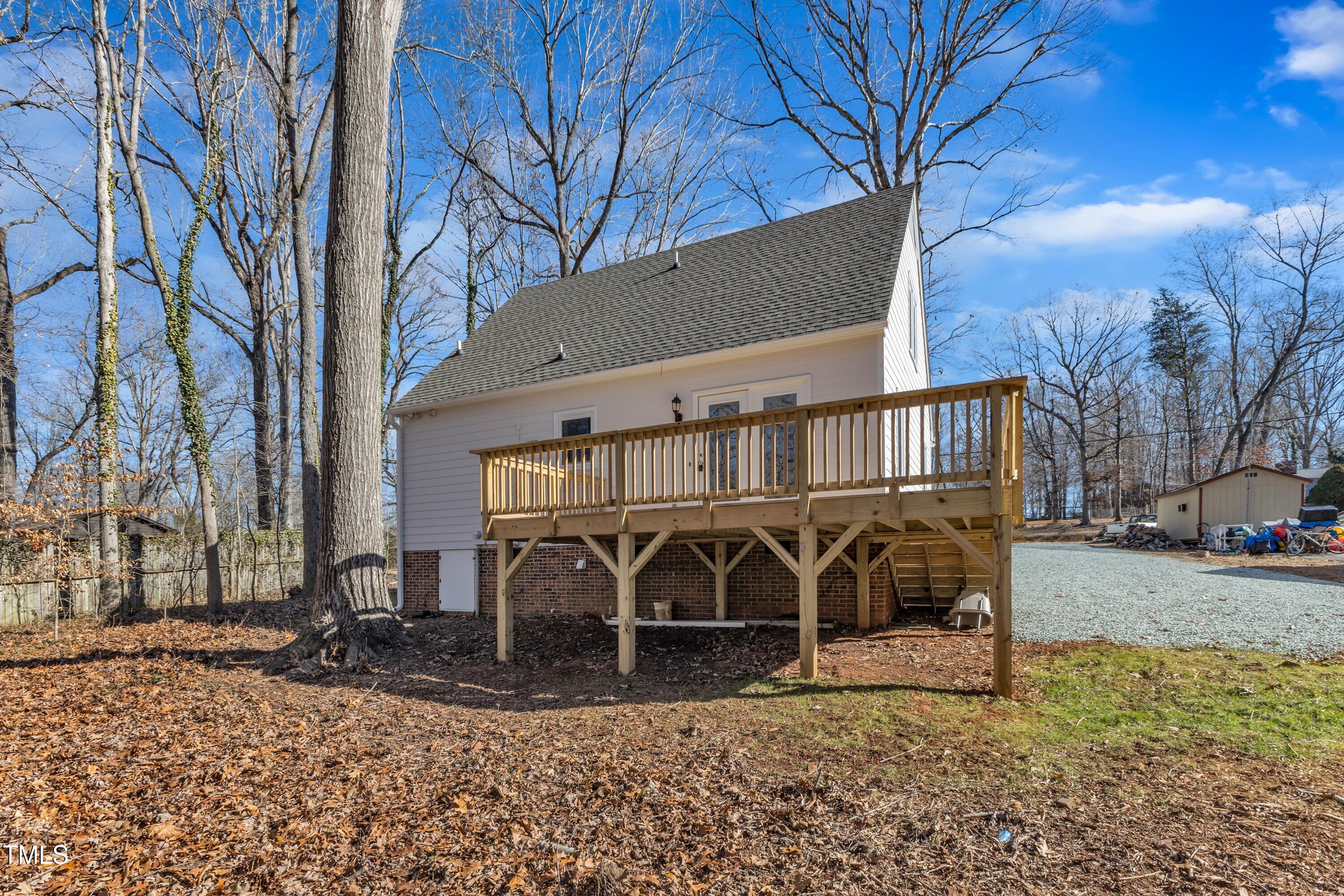 612 Miller Road Hillsborough, NC 27278 - Photo 26 of 35 a view of a house with yard and garage