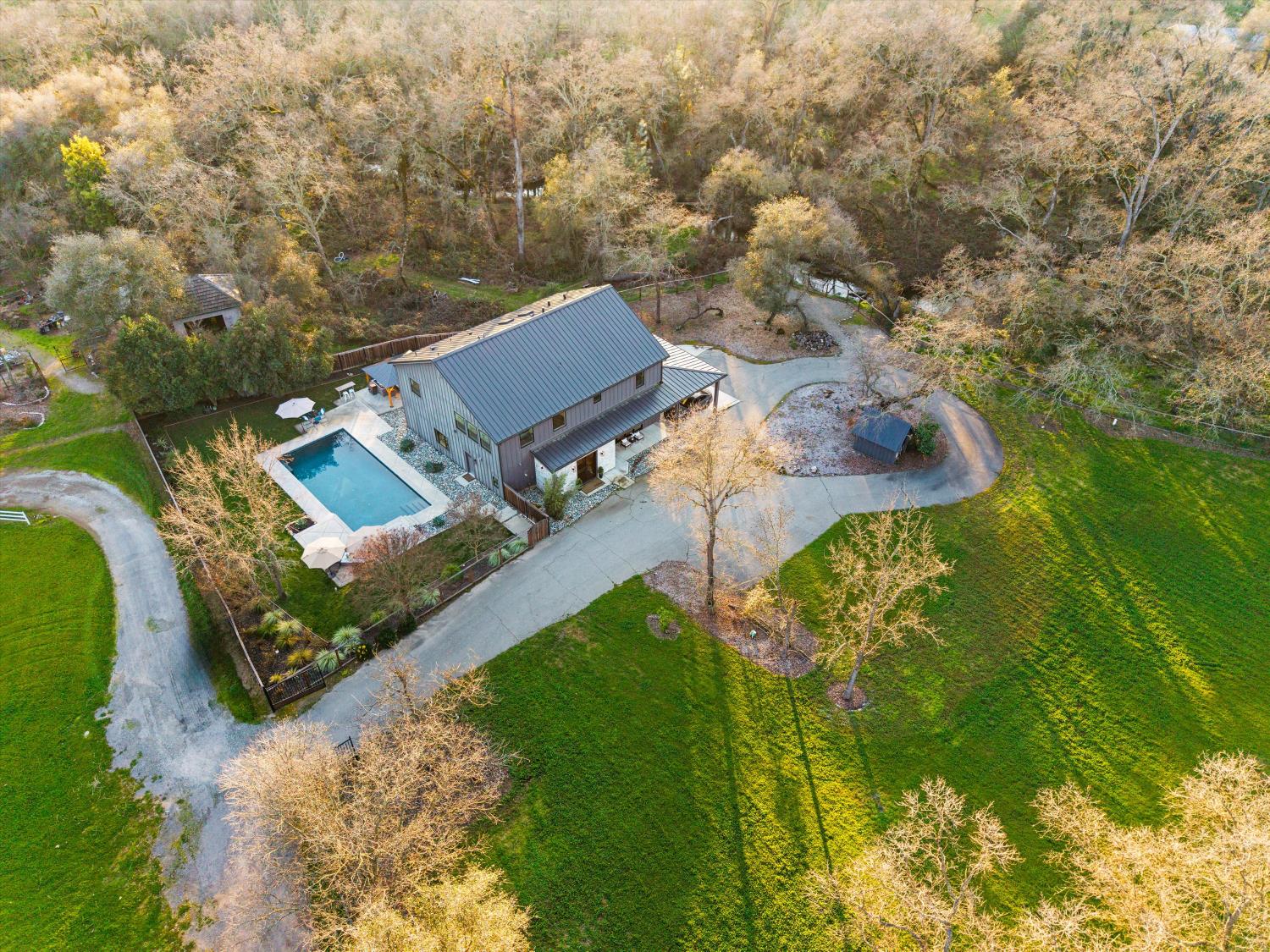 6620 Auburn Folsom Road Granite Bay, CA 95746 - Photo 1 of 69 an aerial view of a house with a yard basket ball court and outdoor seating
