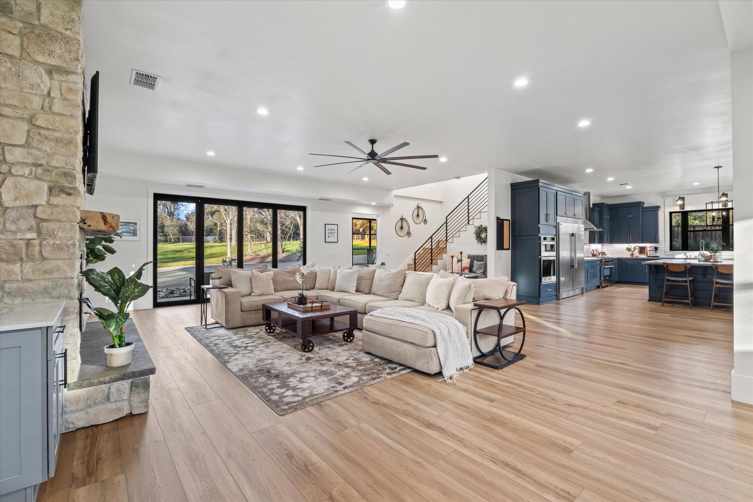 6620 Auburn Folsom Road Granite Bay, CA 95746 - Photo 12 of 69 a living room with furniture and a wooden floor