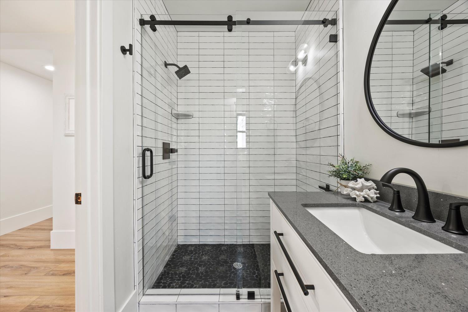 6620 Auburn Folsom Road Granite Bay, CA 95746 - Photo 26 of 69 a bathroom with a sink and a mirror