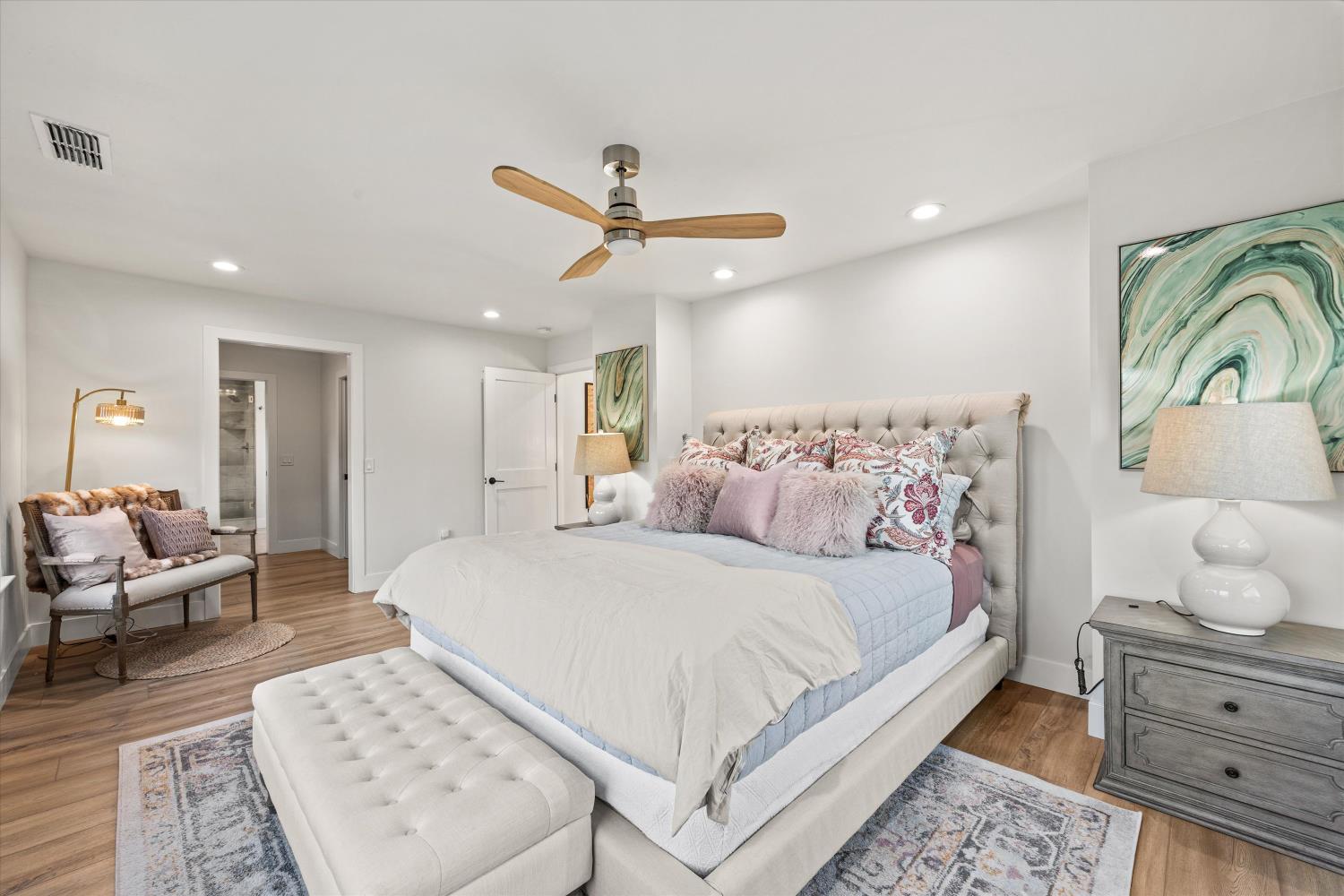 6620 Auburn Folsom Road Granite Bay, CA 95746 - Photo 28 of 69 a bedroom with a large bed and a couch