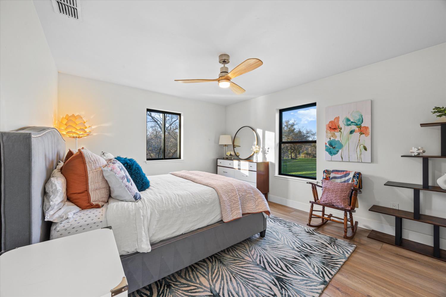 6620 Auburn Folsom Road Granite Bay, CA 95746 - Photo 33 of 69 a bedroom with a bed and wooden floor