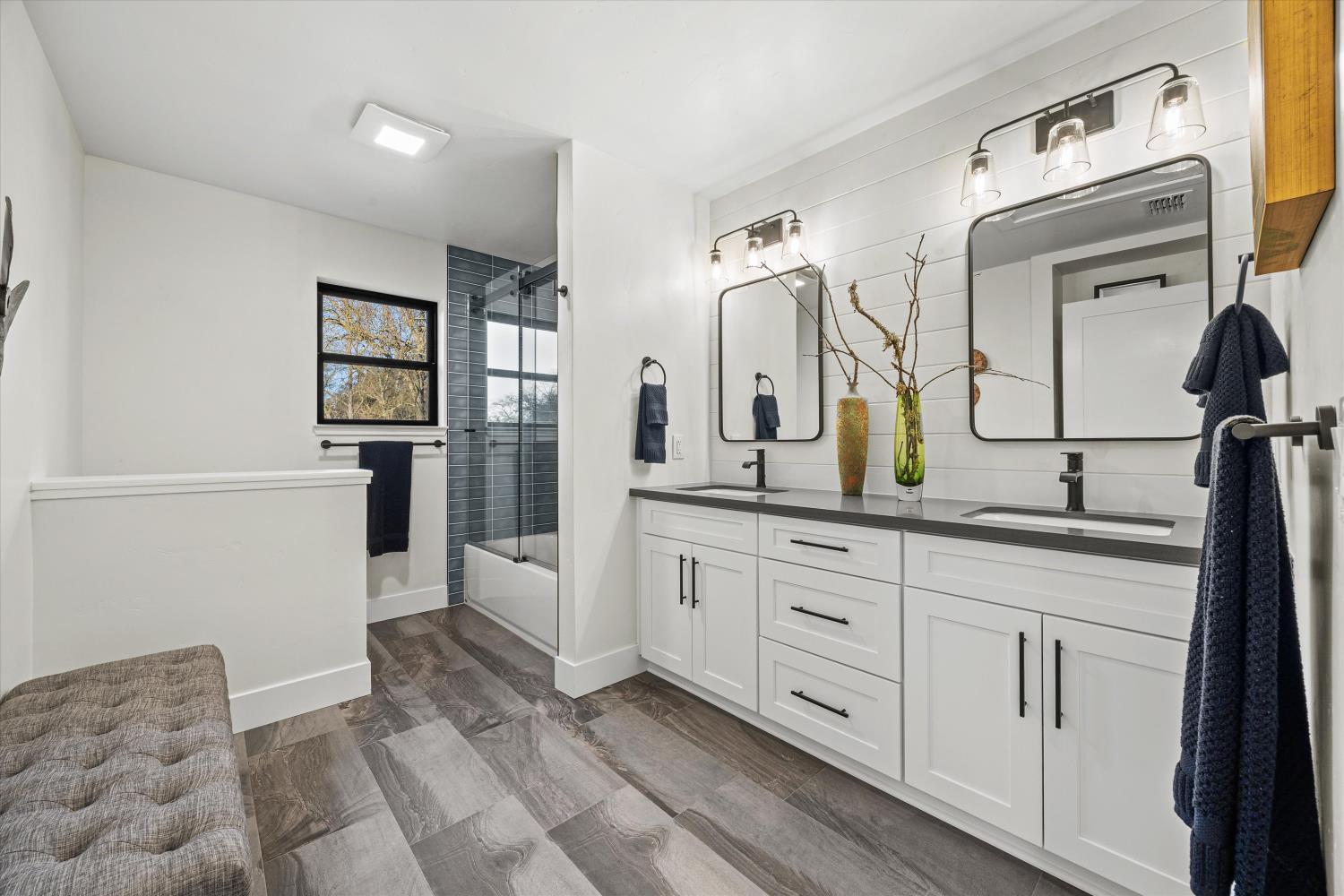 6620 Auburn Folsom Road Granite Bay, CA 95746 - Photo 34 of 69 a spacious bathroom with a double vanity sink and a mirror