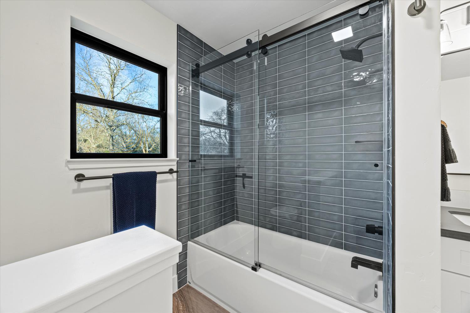 6620 Auburn Folsom Road Granite Bay, CA 95746 - Photo 35 of 69 a bathroom with a bathtub and window