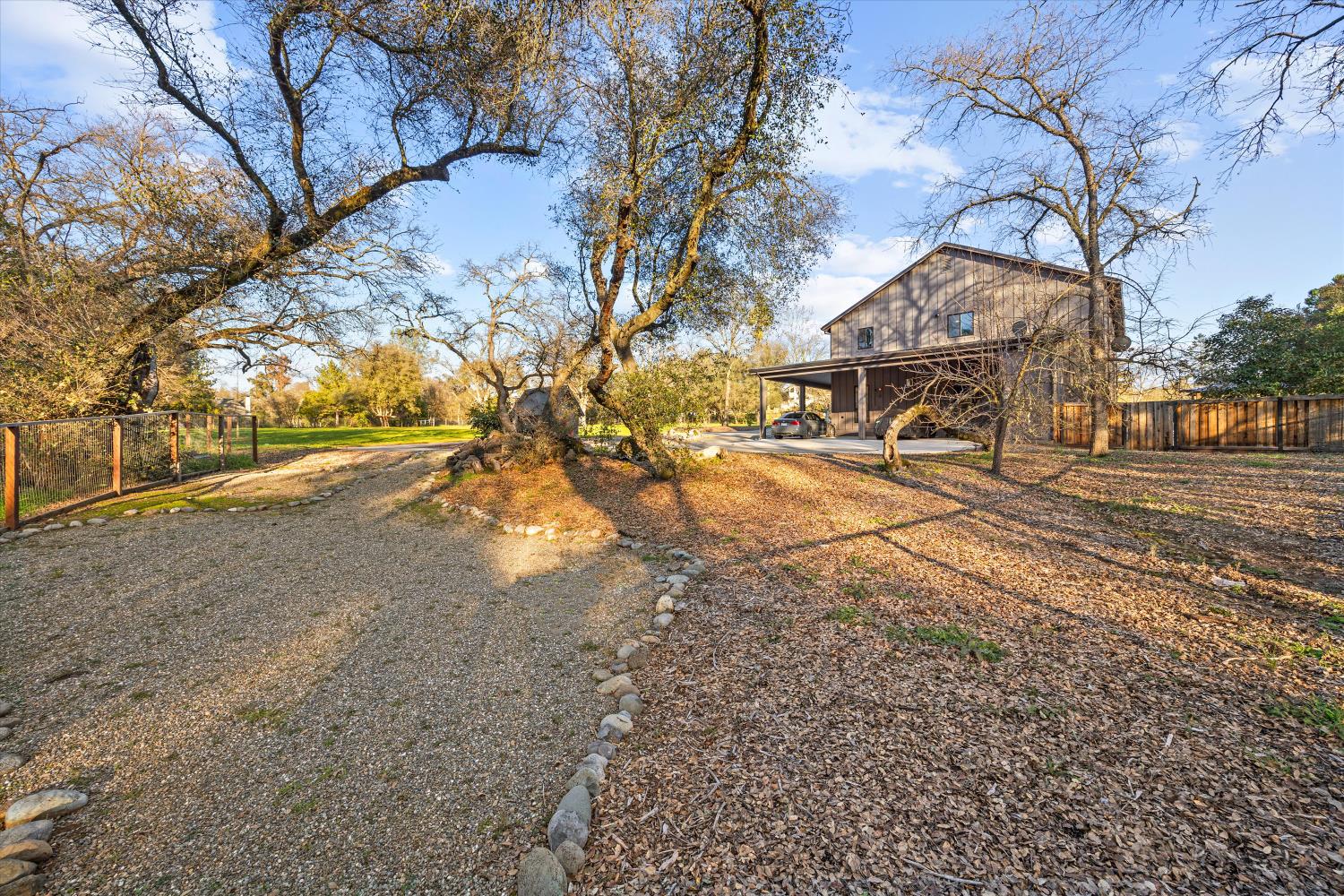 6620 Auburn Folsom Road Granite Bay, CA 95746 - Photo 49 of 69 a view of a yard with snow on the road