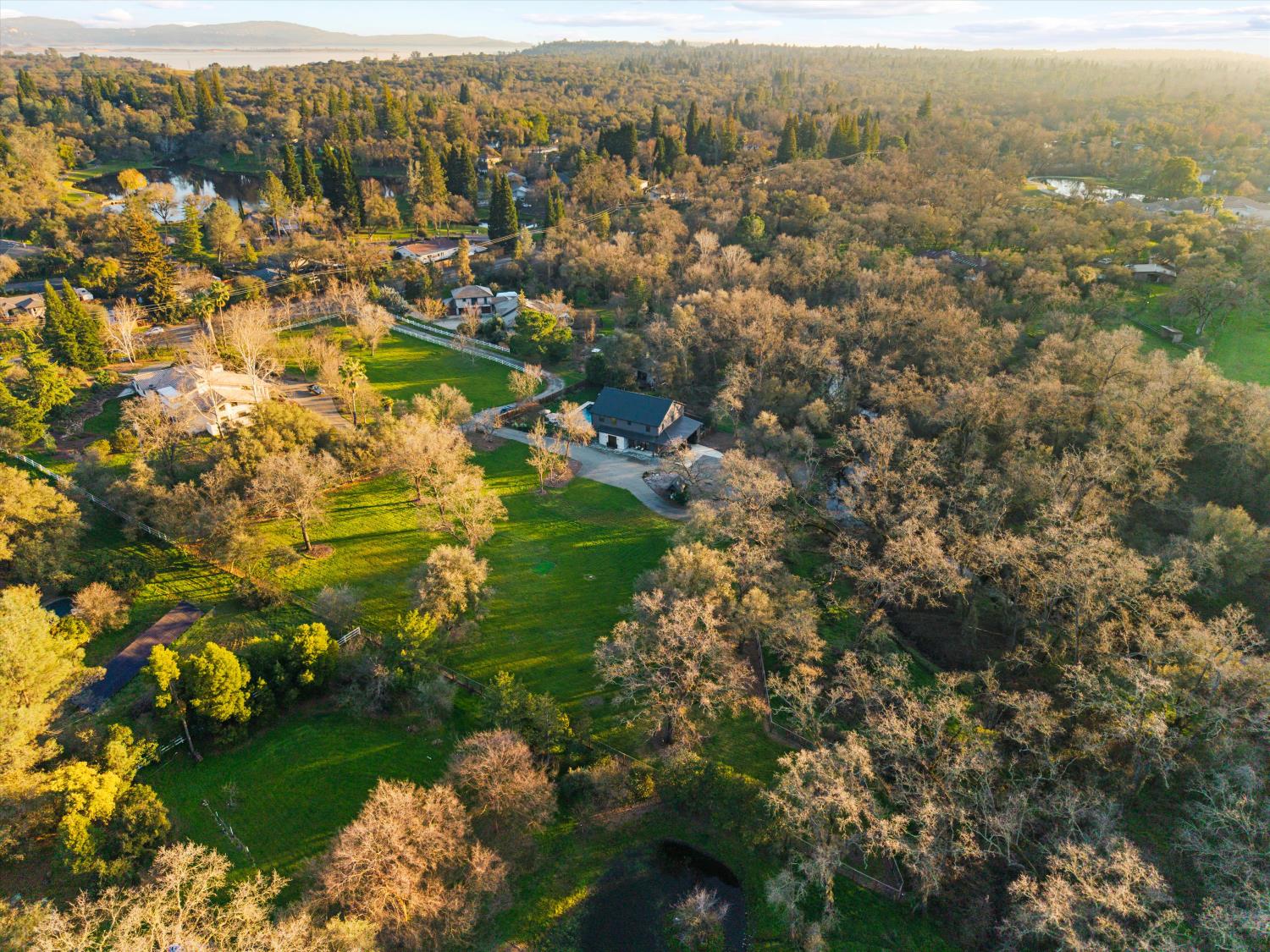 6620 Auburn Folsom Road Granite Bay, CA 95746 - Photo 63 of 69 an aerial view of residential houses with outdoor space and trees