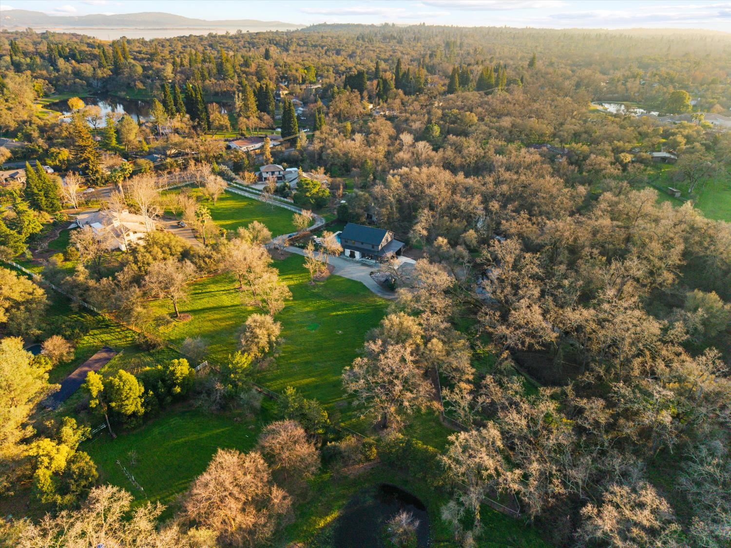 6620 Auburn Folsom Road Granite Bay, CA 95746 - Photo 64 of 69 an aerial view of residential houses with outdoor space and trees
