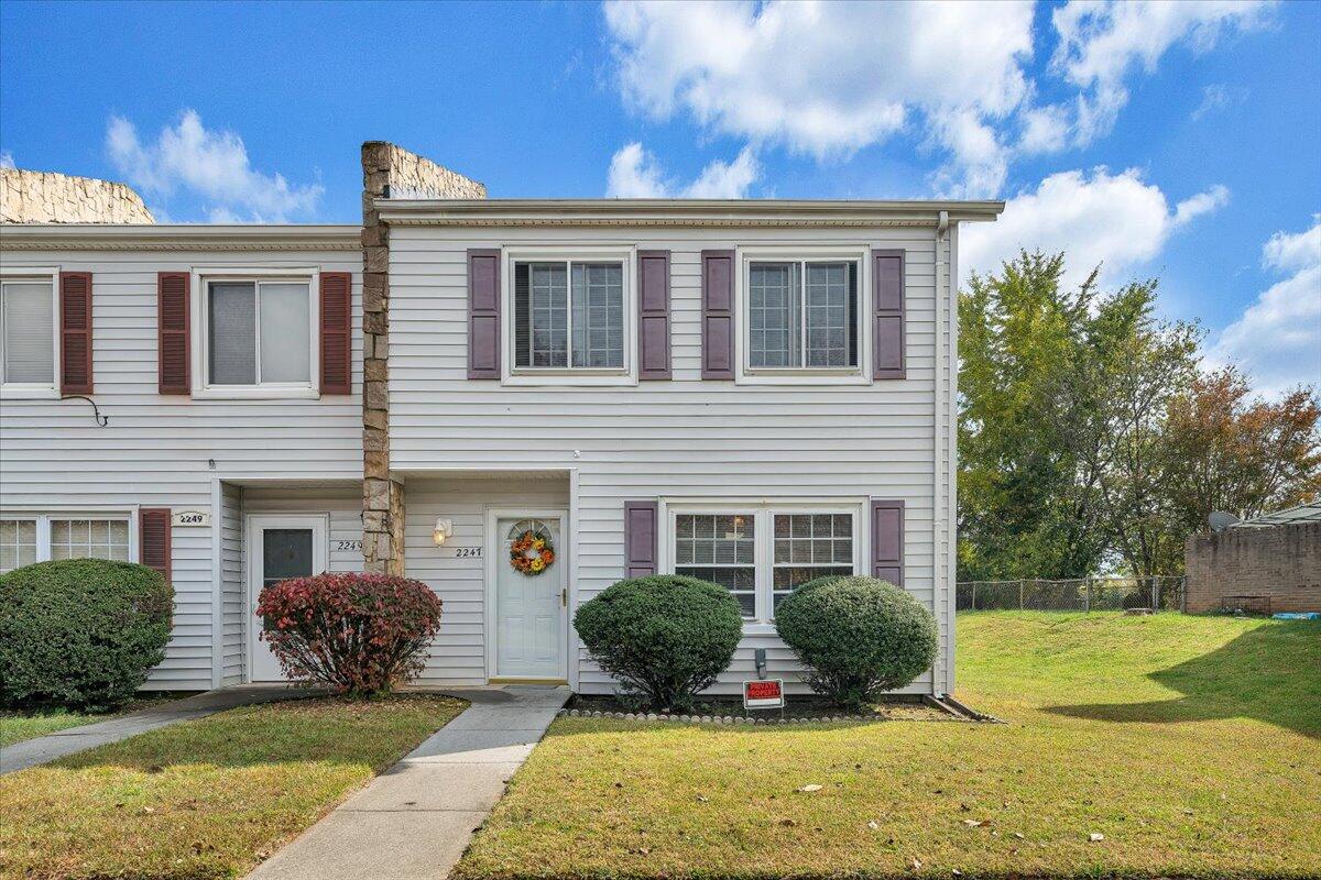 2247 Ranch Road Northwest Roanoke, VA 24017 - Photo 1 of 32 a front view of a house with a yard