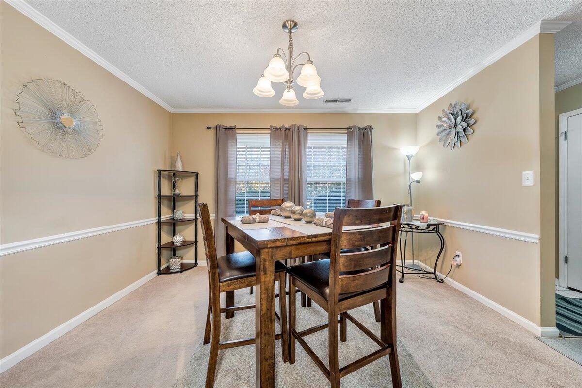 2247 Ranch Road Northwest Roanoke, VA 24017 - Photo 9 of 32 a view of a dining room with furniture and window