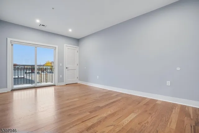 a bathroom with a sink toilet vanity and shower