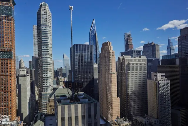 a view of a city with tall buildings