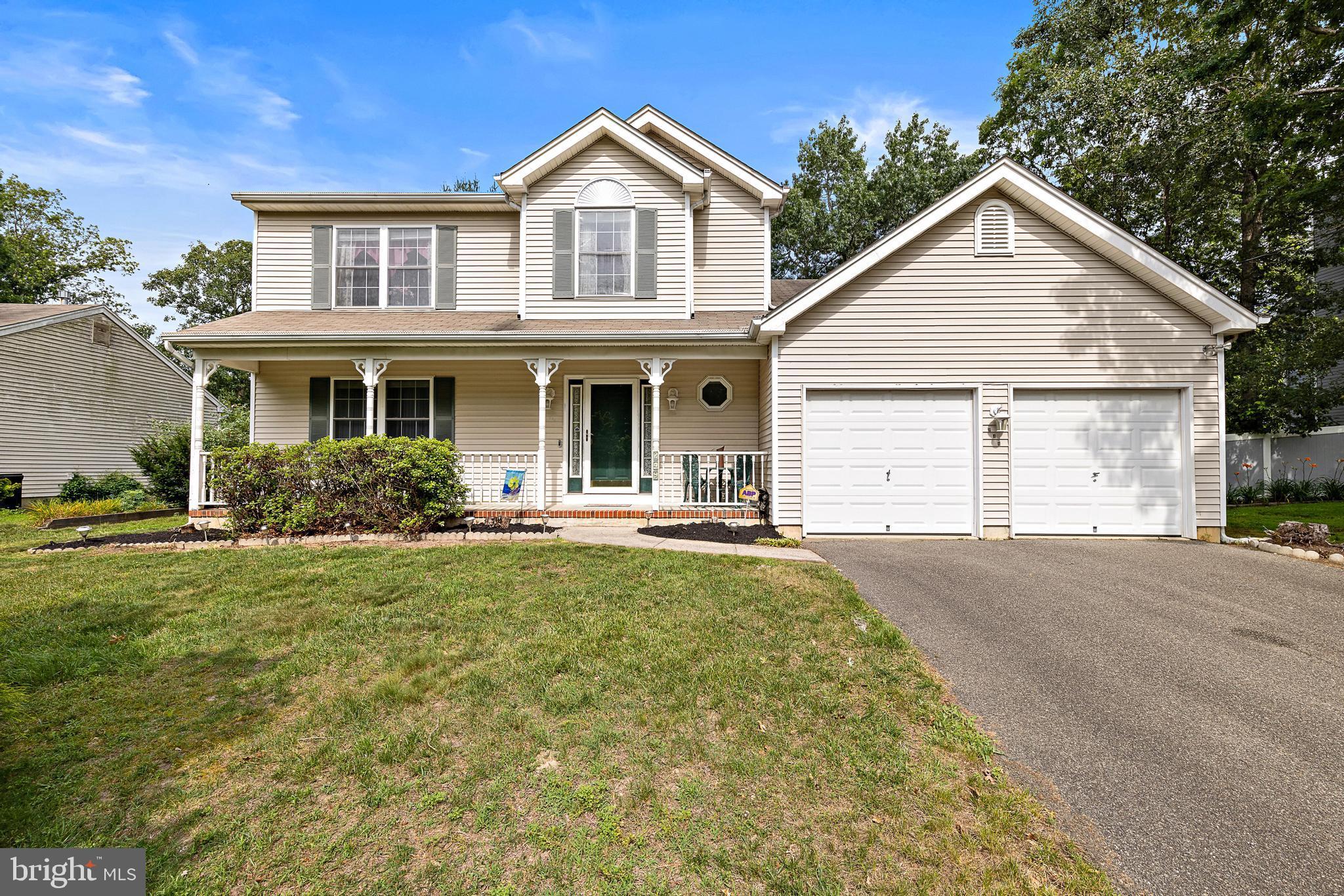 249 Topside Road Manahawkin, NJ 08050 - Photo 1 of 49 a view of a yard in front of house