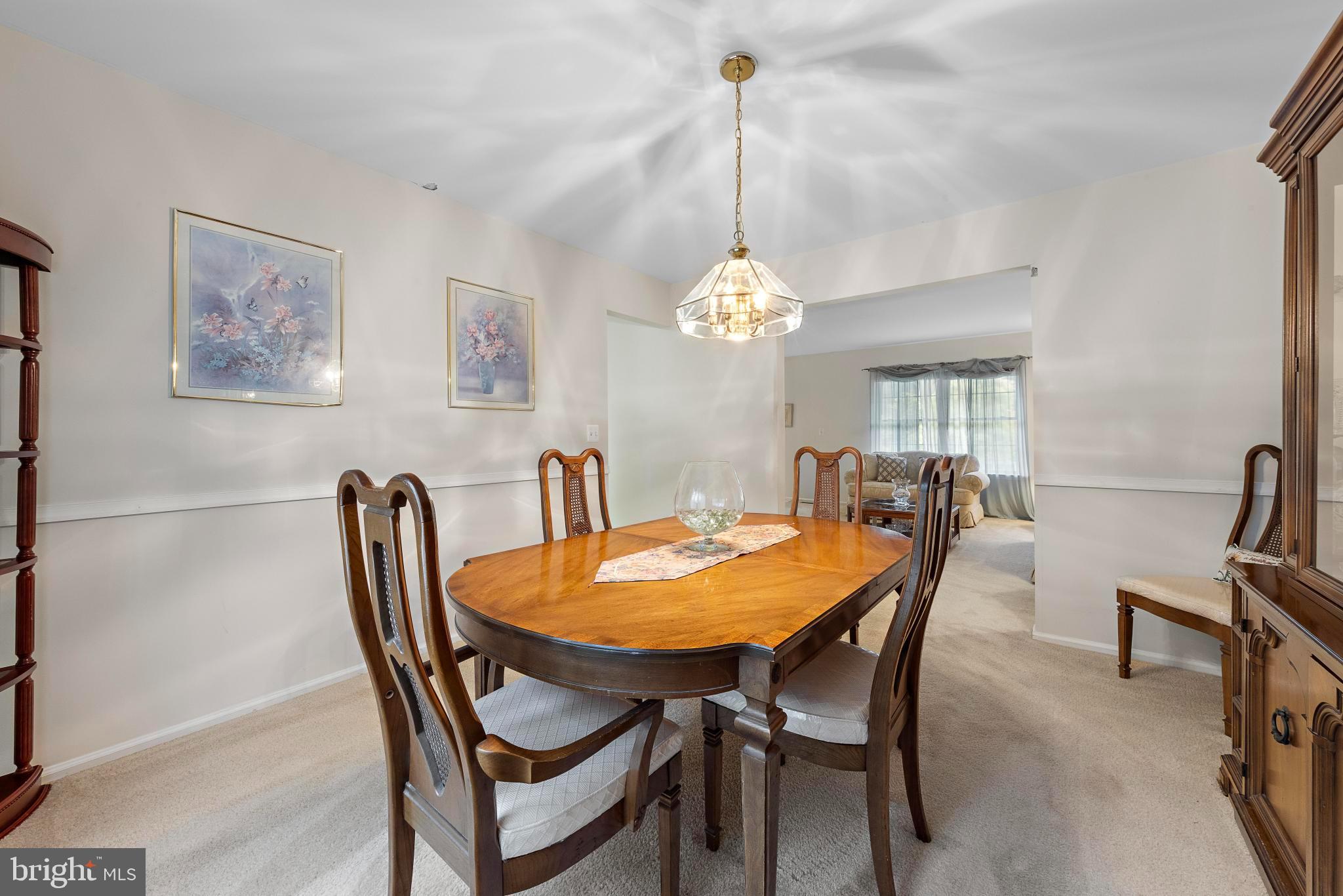 249 Topside Road Manahawkin, NJ 08050 - Photo 11 of 49 a view of a dining room with furniture