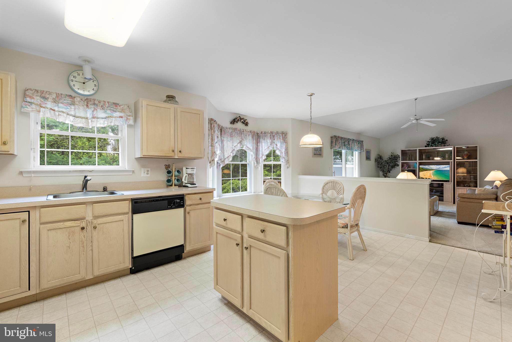 249 Topside Road Manahawkin, NJ 08050 - Photo 15 of 49 a kitchen with a sink and cabinets