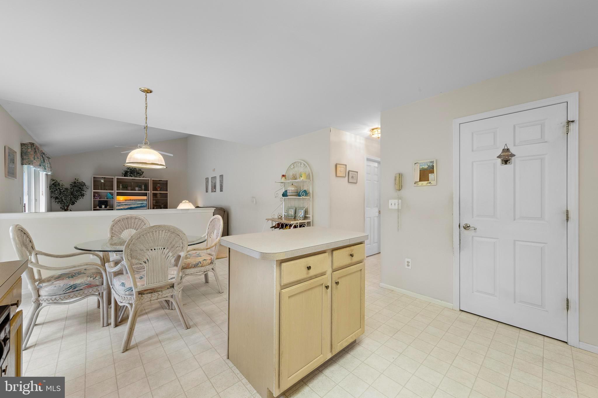 249 Topside Road Manahawkin, NJ 08050 - Photo 18 of 49 a dining room with furniture and window