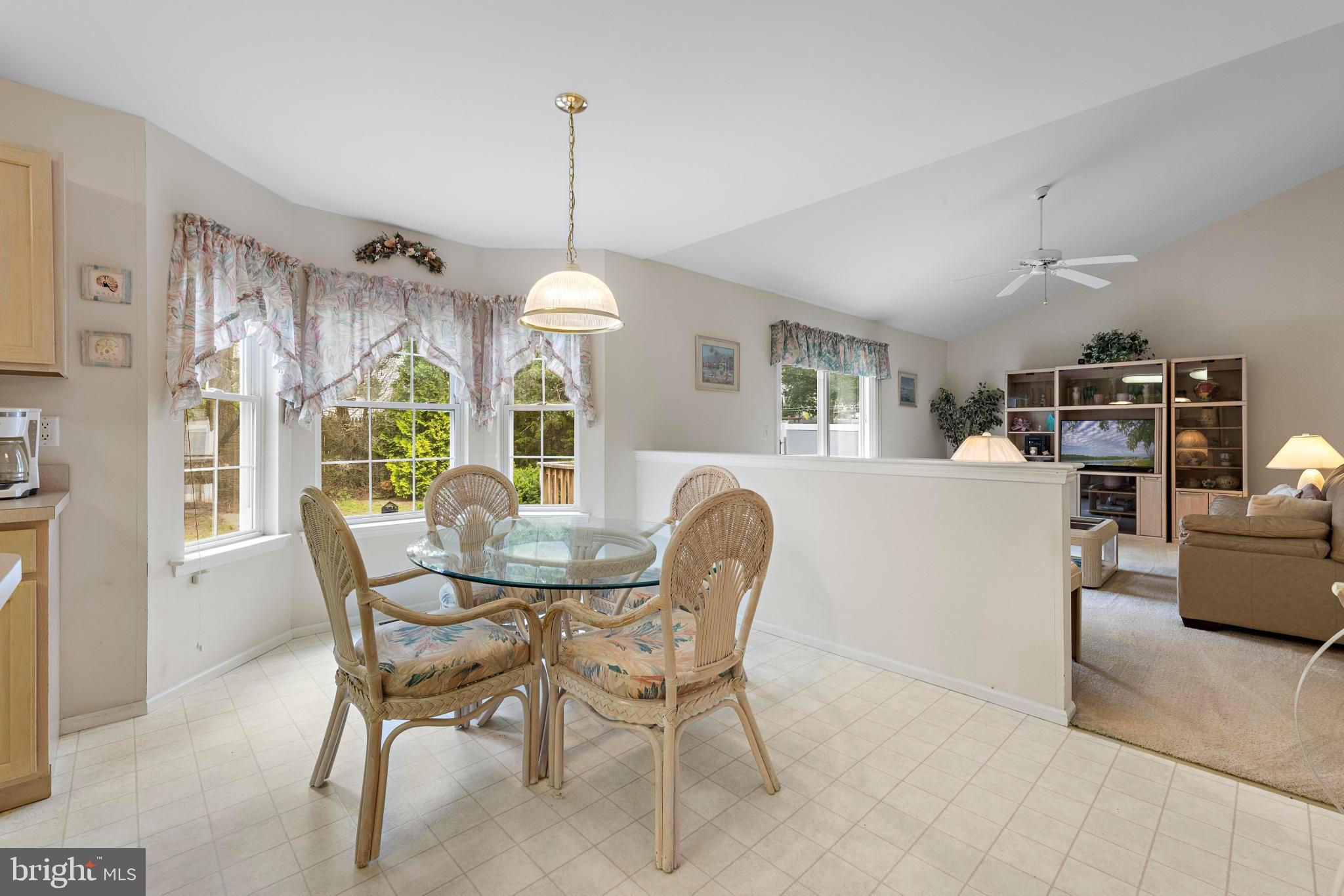 249 Topside Road Manahawkin, NJ 08050 - Photo 20 of 49 a view of a dining room with furniture window and outside view