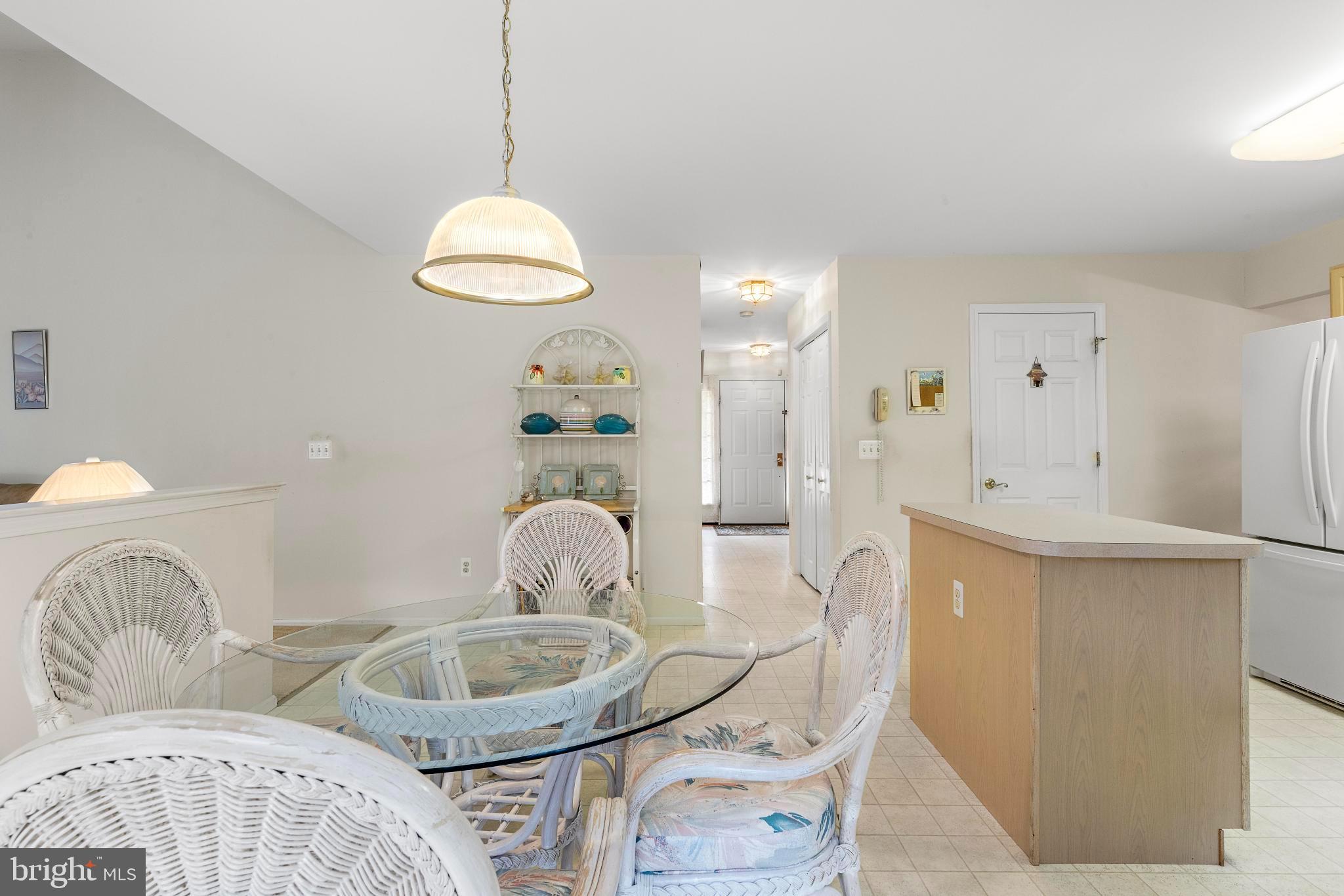 249 Topside Road Manahawkin, NJ 08050 - Photo 22 of 49 a living room with furniture and a table