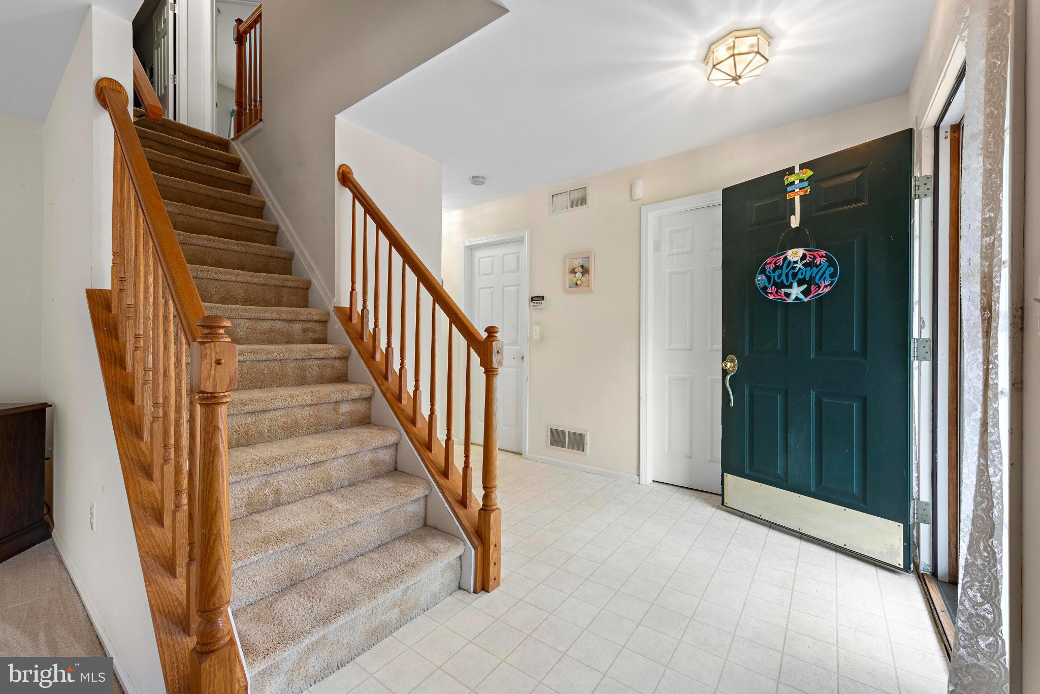 249 Topside Road Manahawkin, NJ 08050 - Photo 24 of 49 a view of an entryway with wooden floor