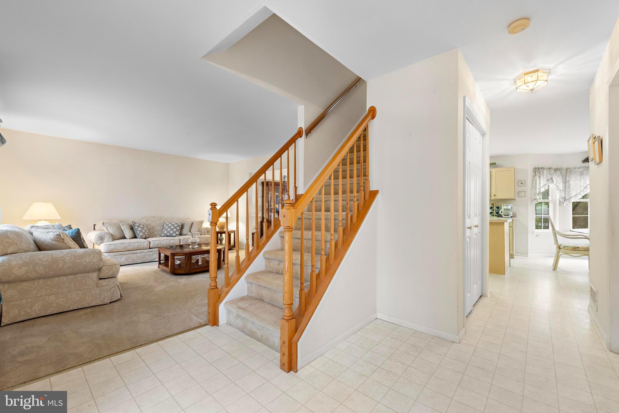 249 Topside Road Manahawkin, NJ 08050 - Photo 26 of 49 a view of livingroom with furniture and stairs