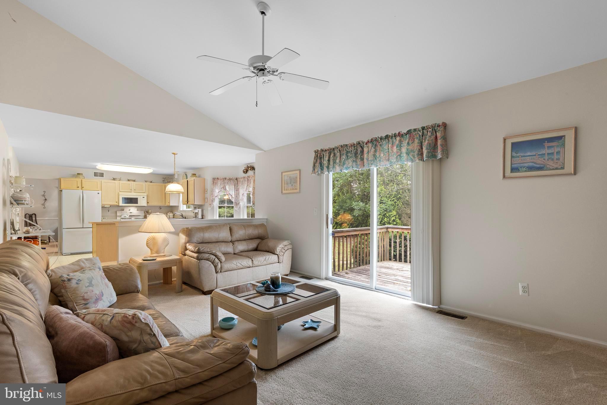 249 Topside Road Manahawkin, NJ 08050 - Photo 30 of 49 a living room with furniture and a large window