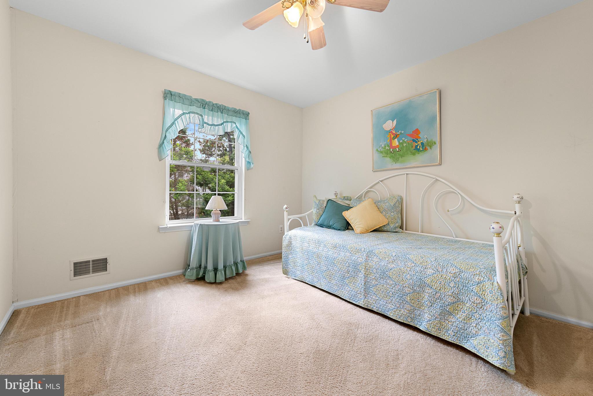 249 Topside Road Manahawkin, NJ 08050 - Photo 31 of 49 a living room with furniture and a window