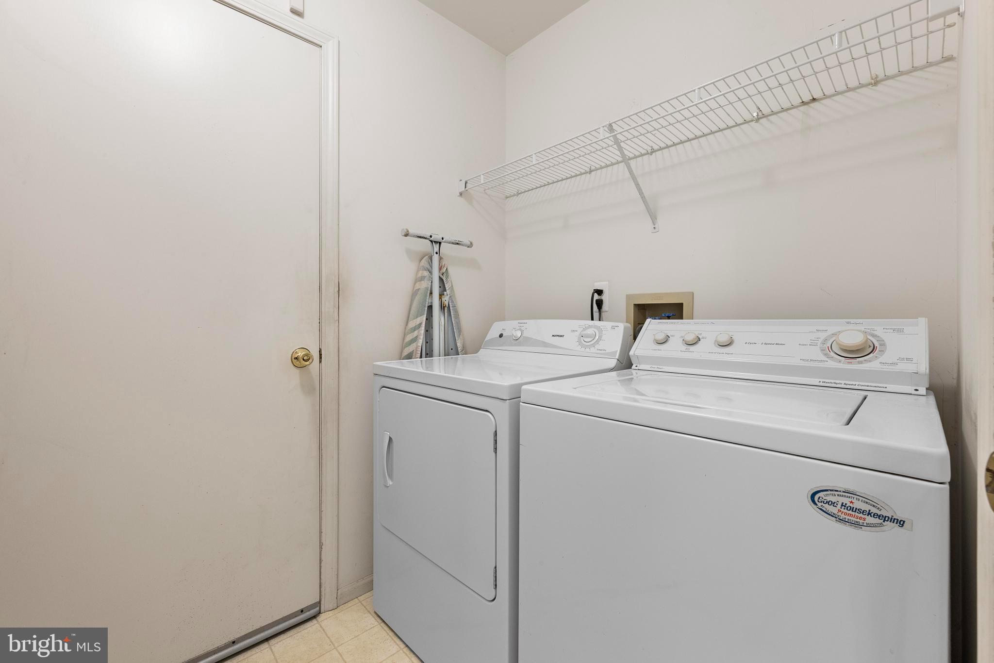 249 Topside Road Manahawkin, NJ 08050 - Photo 43 of 49 a utility room with dryer and washer
