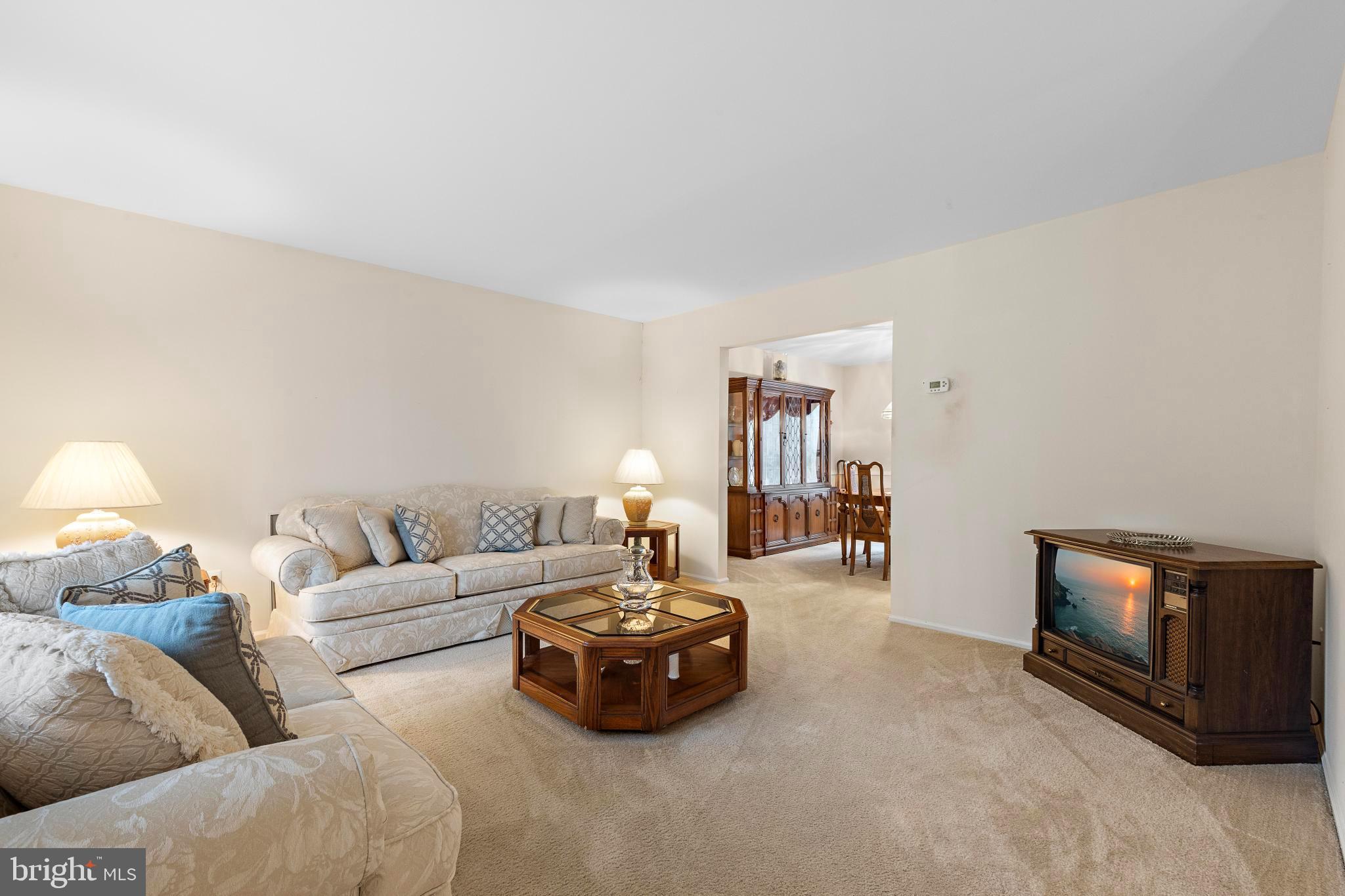 249 Topside Road Manahawkin, NJ 08050 - Photo 7 of 49 a living room with furniture and a flat screen tv
