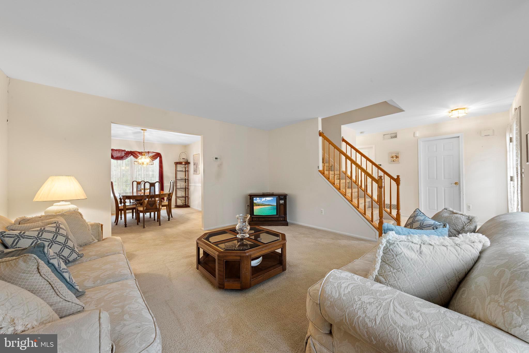 249 Topside Road Manahawkin, NJ 08050 - Photo 9 of 49 a living room with furniture and a wooden floor