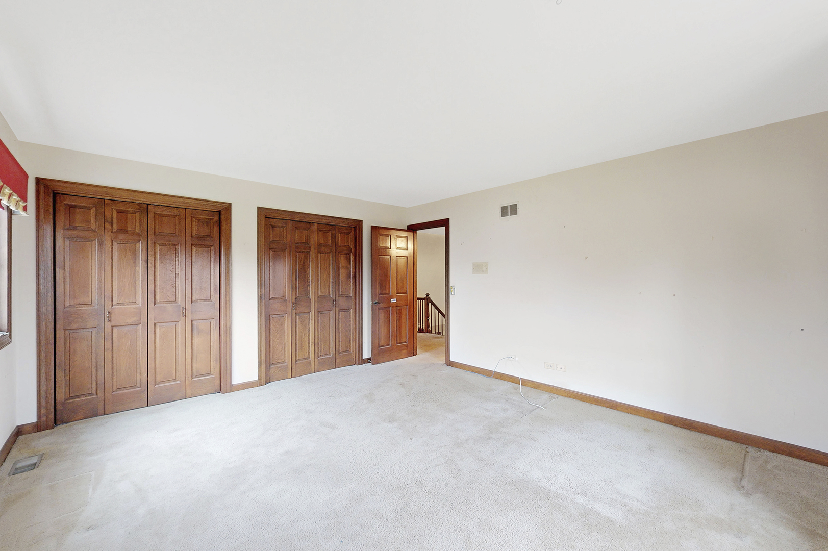 8282 Lake Ridge Drive Burr Ridge, IL 60527 - Photo 22 of 37 a view of an empty room and closet area