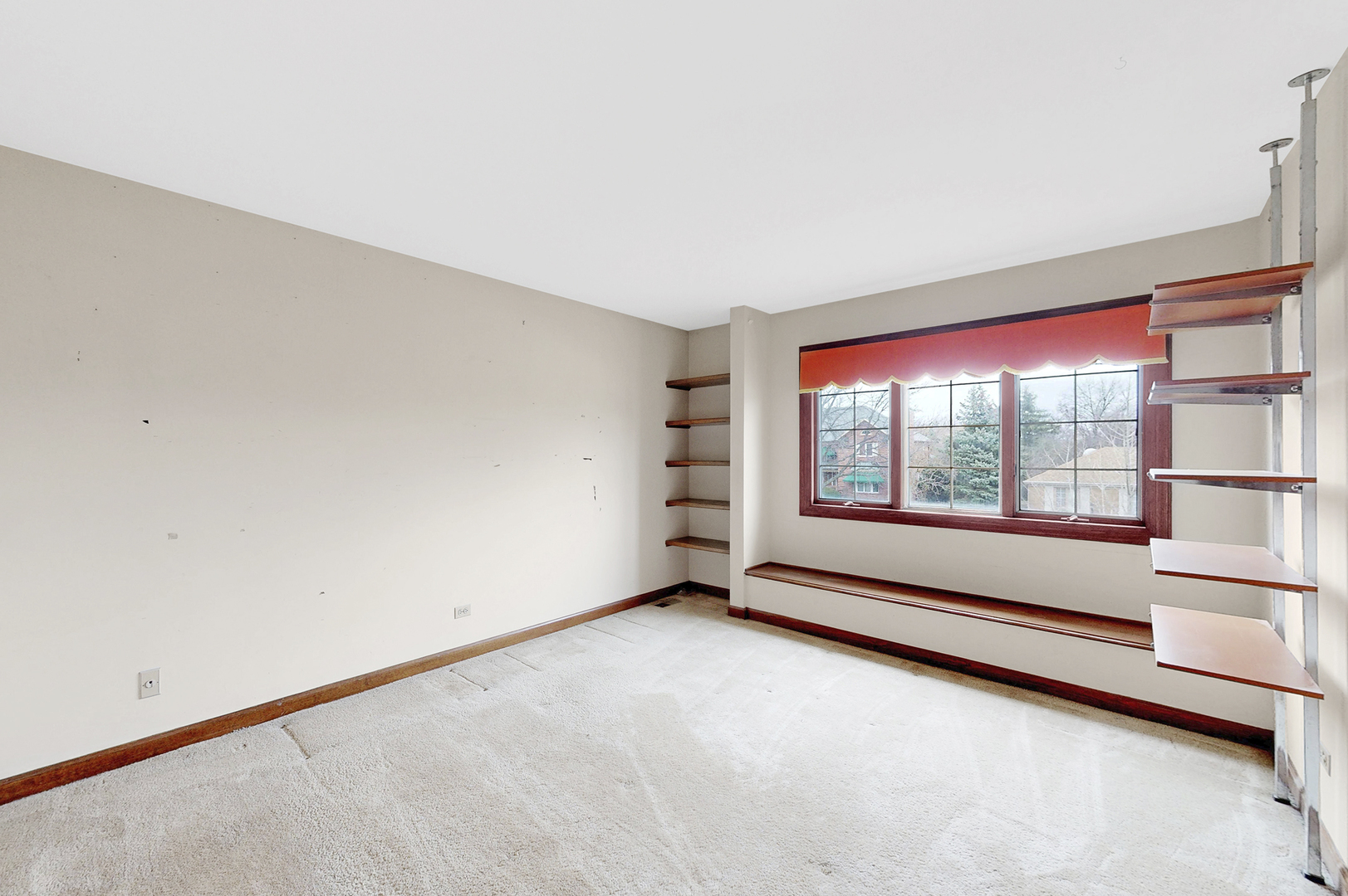 8282 Lake Ridge Drive Burr Ridge, IL 60527 - Photo 23 of 37 an empty room with windows