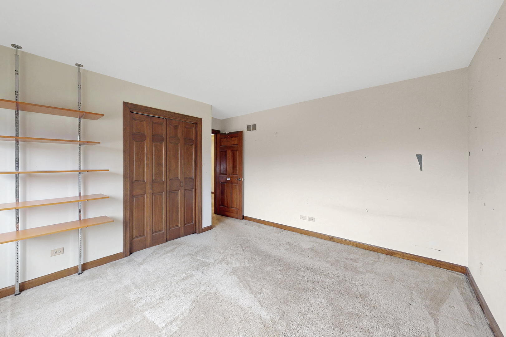 8282 Lake Ridge Drive Burr Ridge, IL 60527 - Photo 24 of 37 an empty room with closet