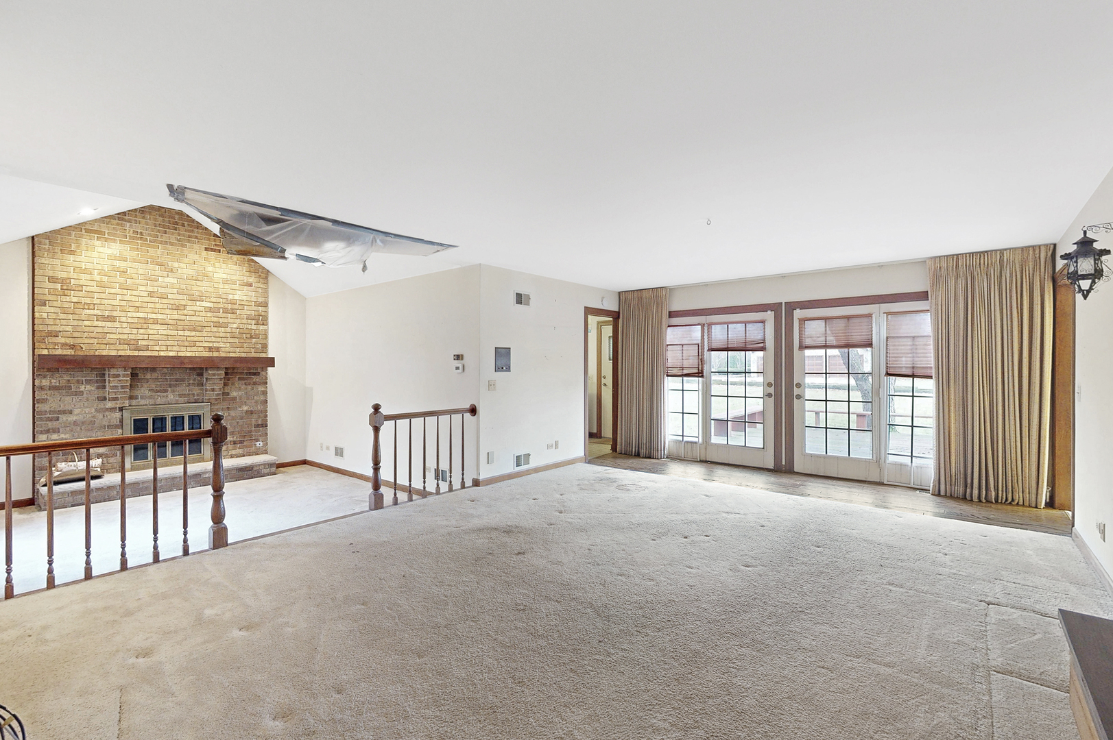 8282 Lake Ridge Drive Burr Ridge, IL 60527 - Photo 9 of 37 a view of an empty room with a window