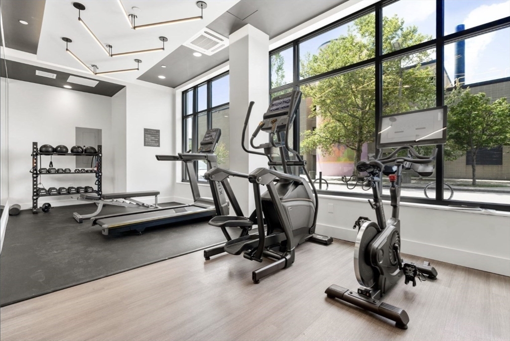301 Border Street, Unit 610 Boston, MA 02128 - Photo 12 of 17 a view of a room with gym equipment