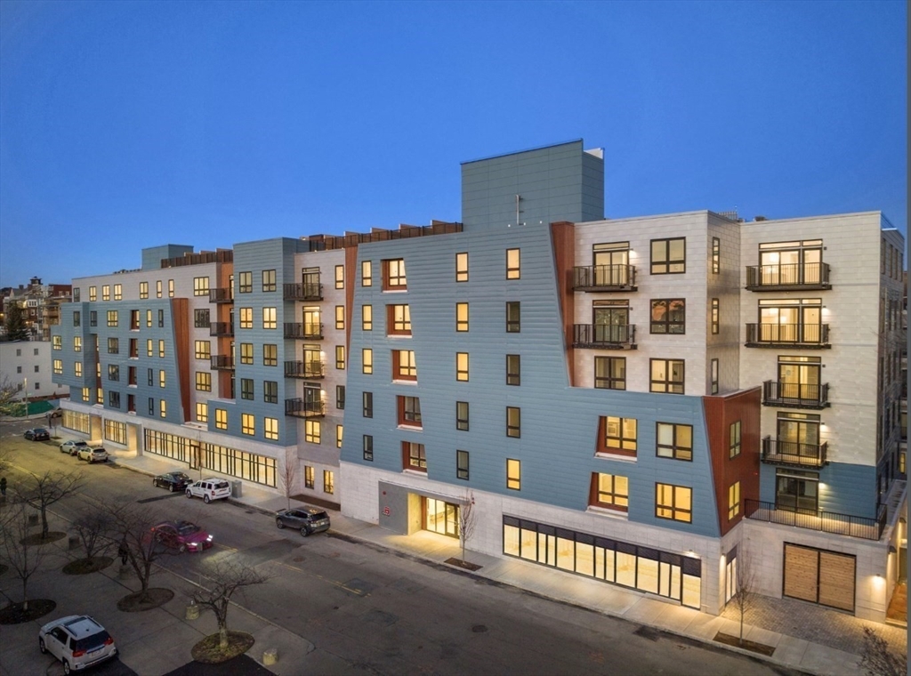 301 Border Street, Unit 610 Boston, MA 02128 - Photo 16 of 17 a view of a building with many windows